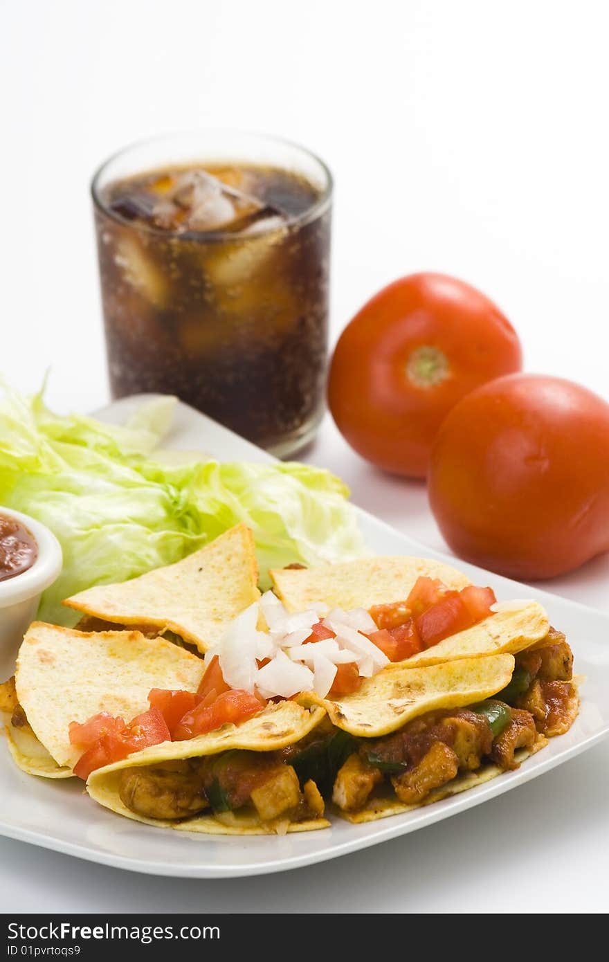 Delicious chicken quesadilla and fresh vegetables isolated