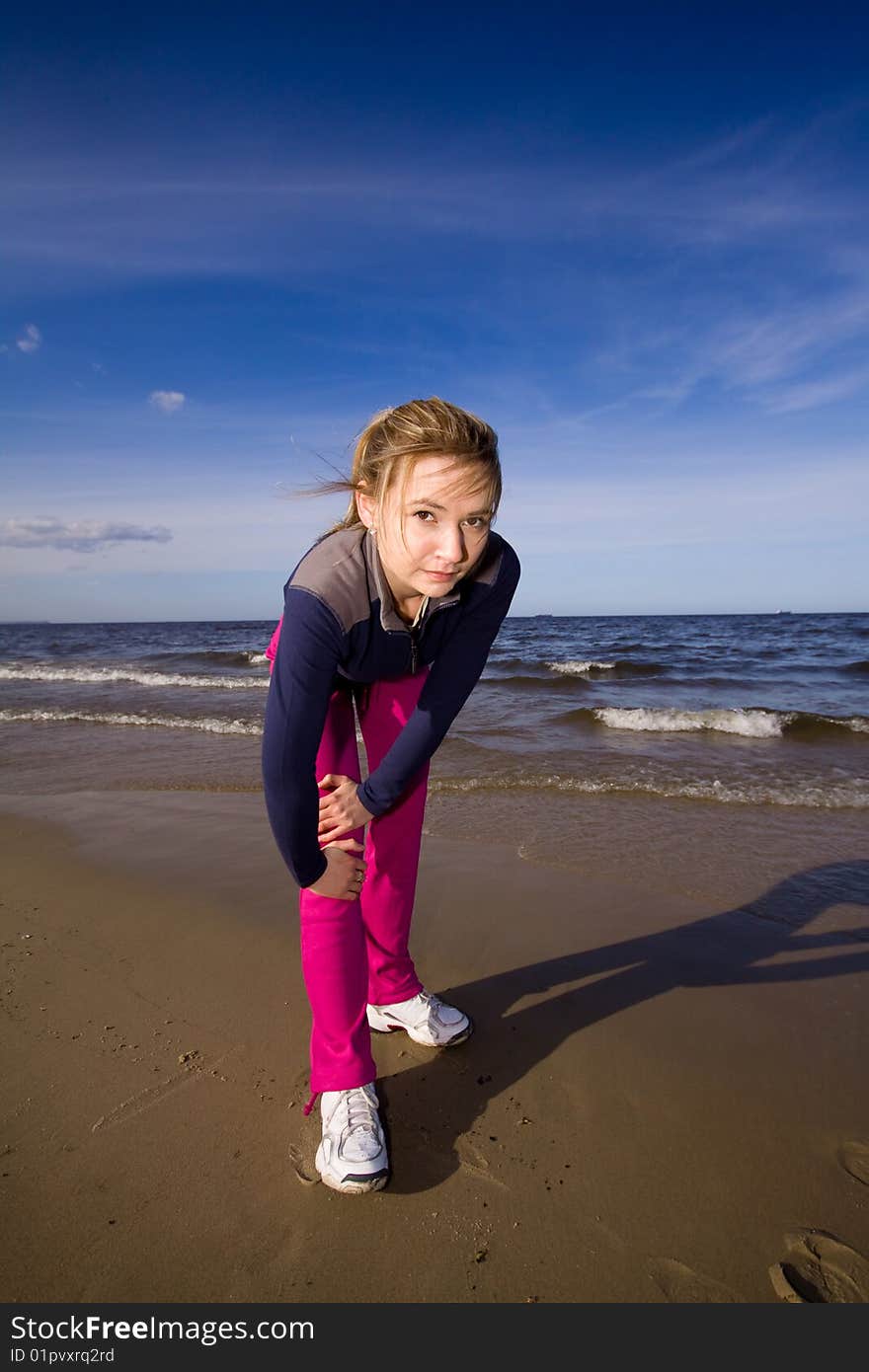 Active woman on the beach