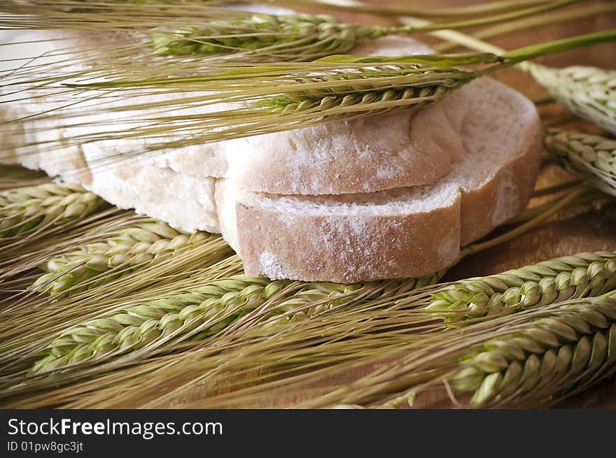 Picture of two slices of bread and wheat ears. Picture of two slices of bread and wheat ears