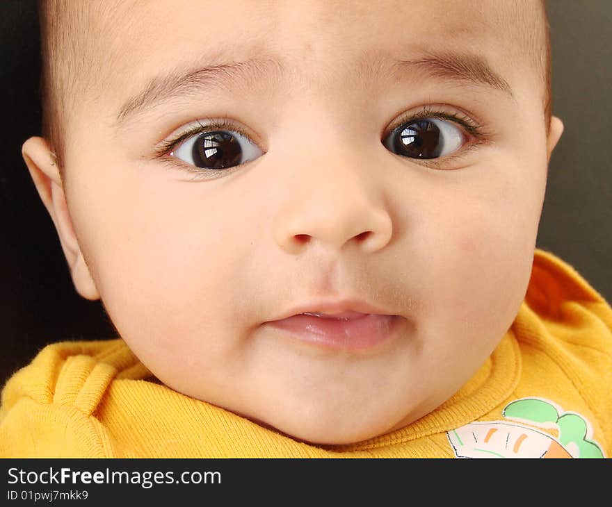 Bright eyed asian baby boy. Bright eyed asian baby boy