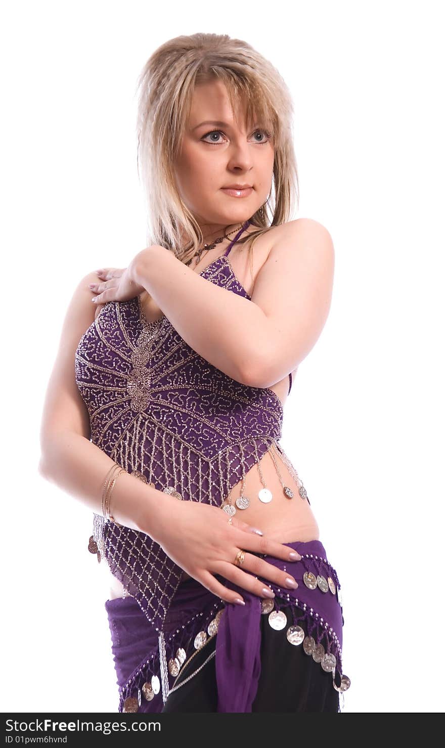 Indian dance. Young woman on white background.