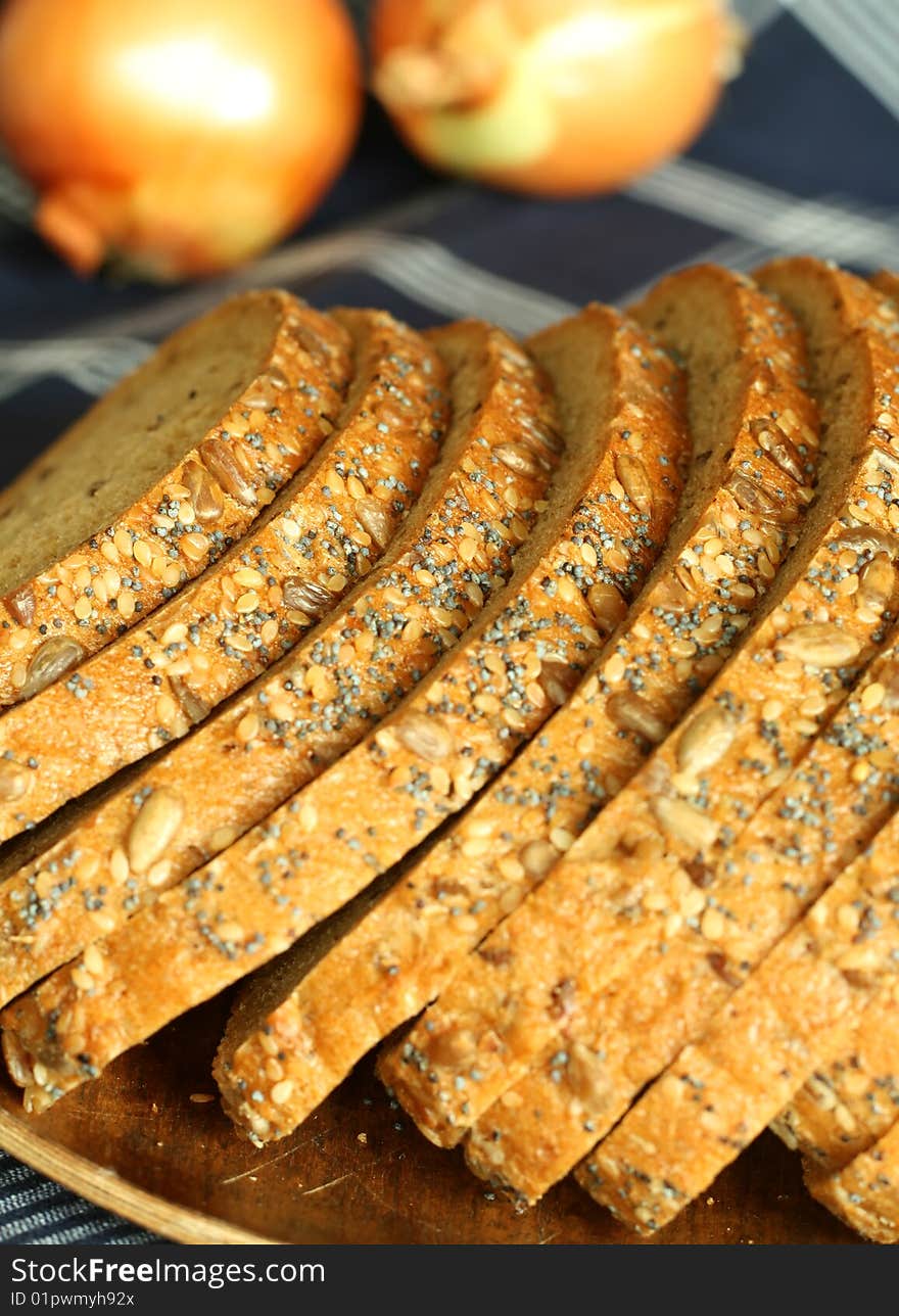 baked bread with sunflower seeds and onions