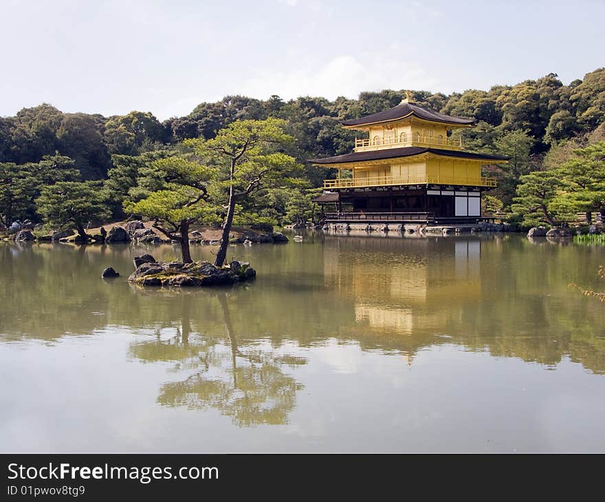 The informal name is Rokuon-ji or Deer Garden Temple, now a gold Zen temple in front of a beautiful lake. The informal name is Rokuon-ji or Deer Garden Temple, now a gold Zen temple in front of a beautiful lake