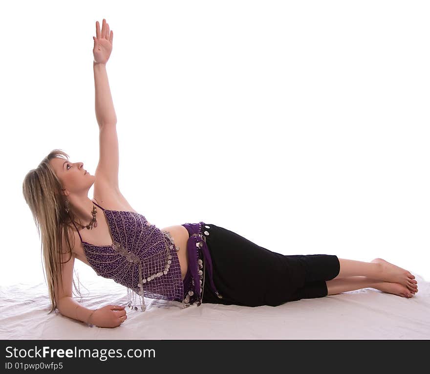 Indian dance. Young woman on white background.