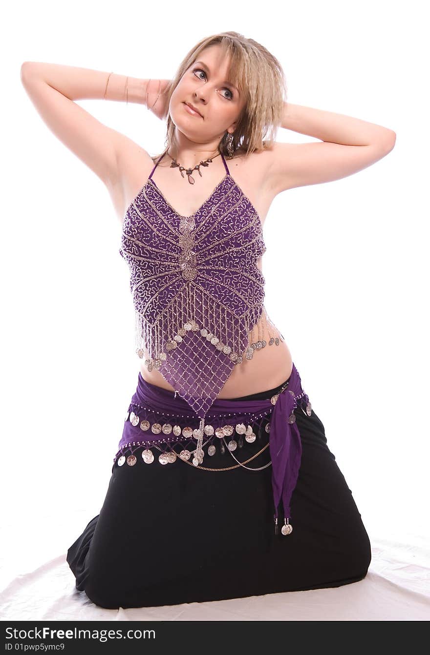 Indian dance. Young woman on white background.