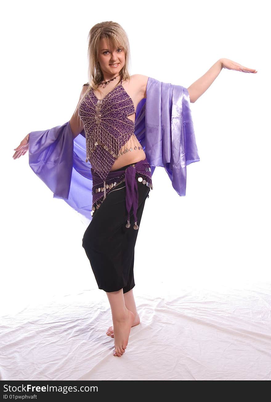 Indian dance. Young woman on white background.