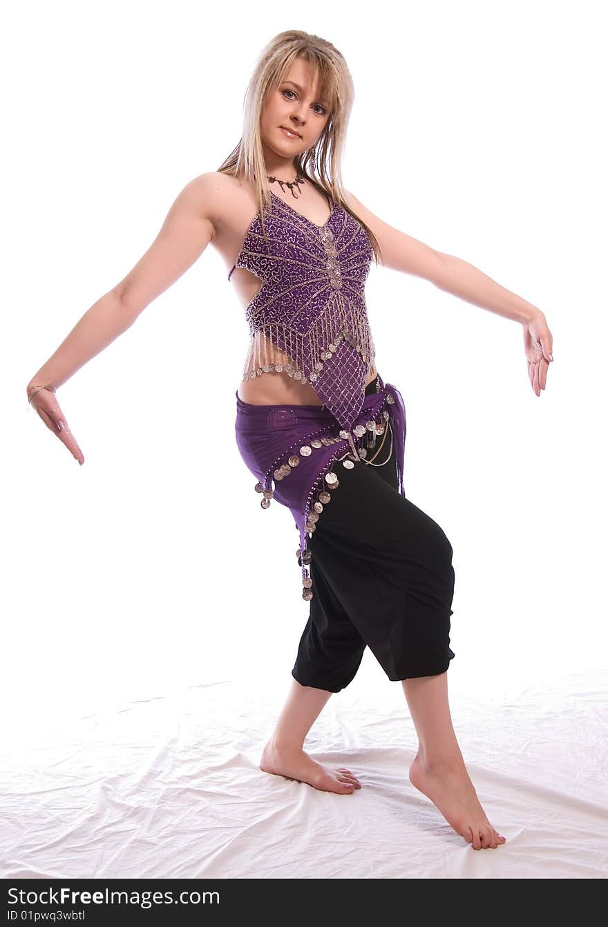 Indian dance. Young woman on white background.