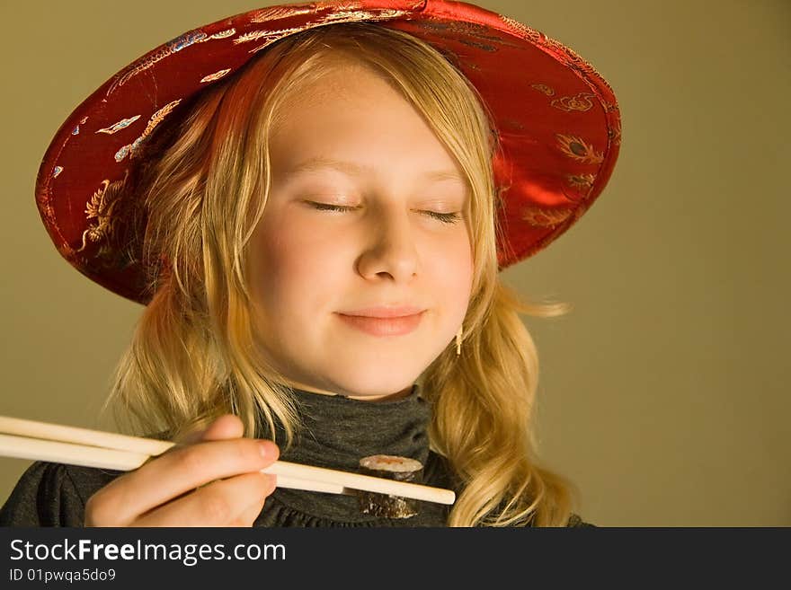 Girl enjoys sushi