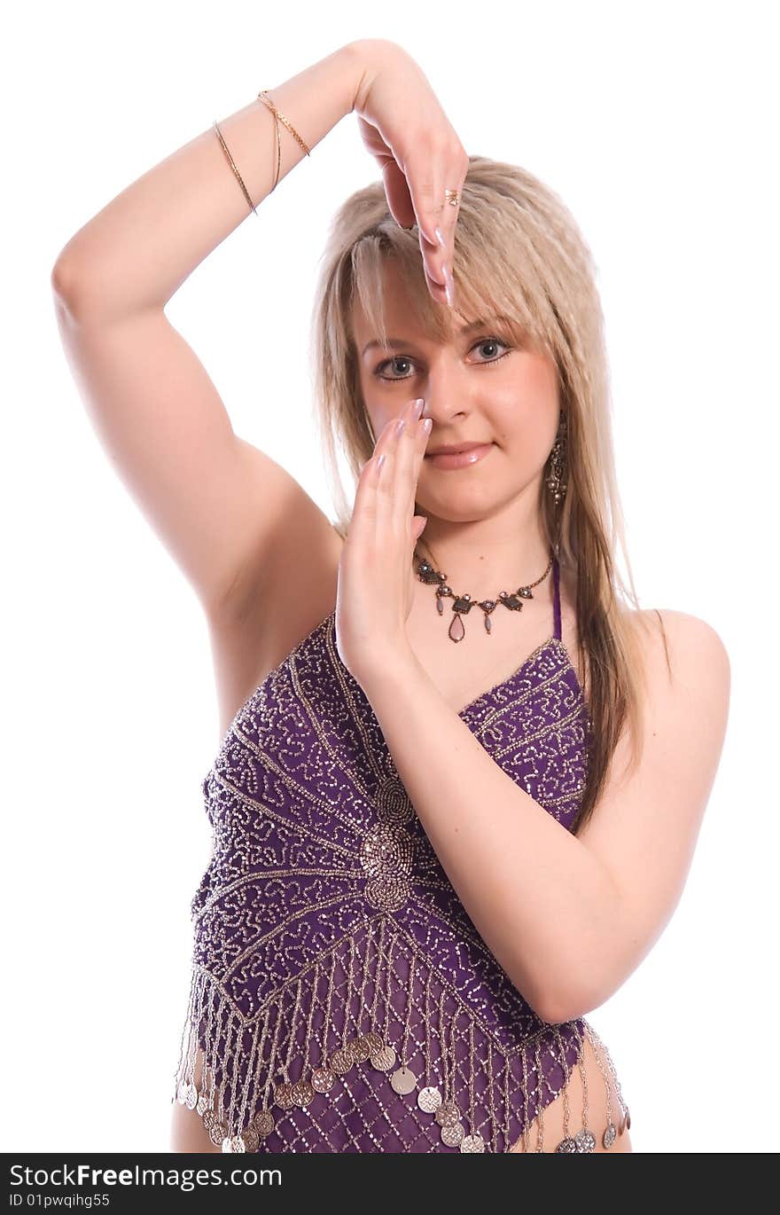 Indian dance. Young woman on white background.