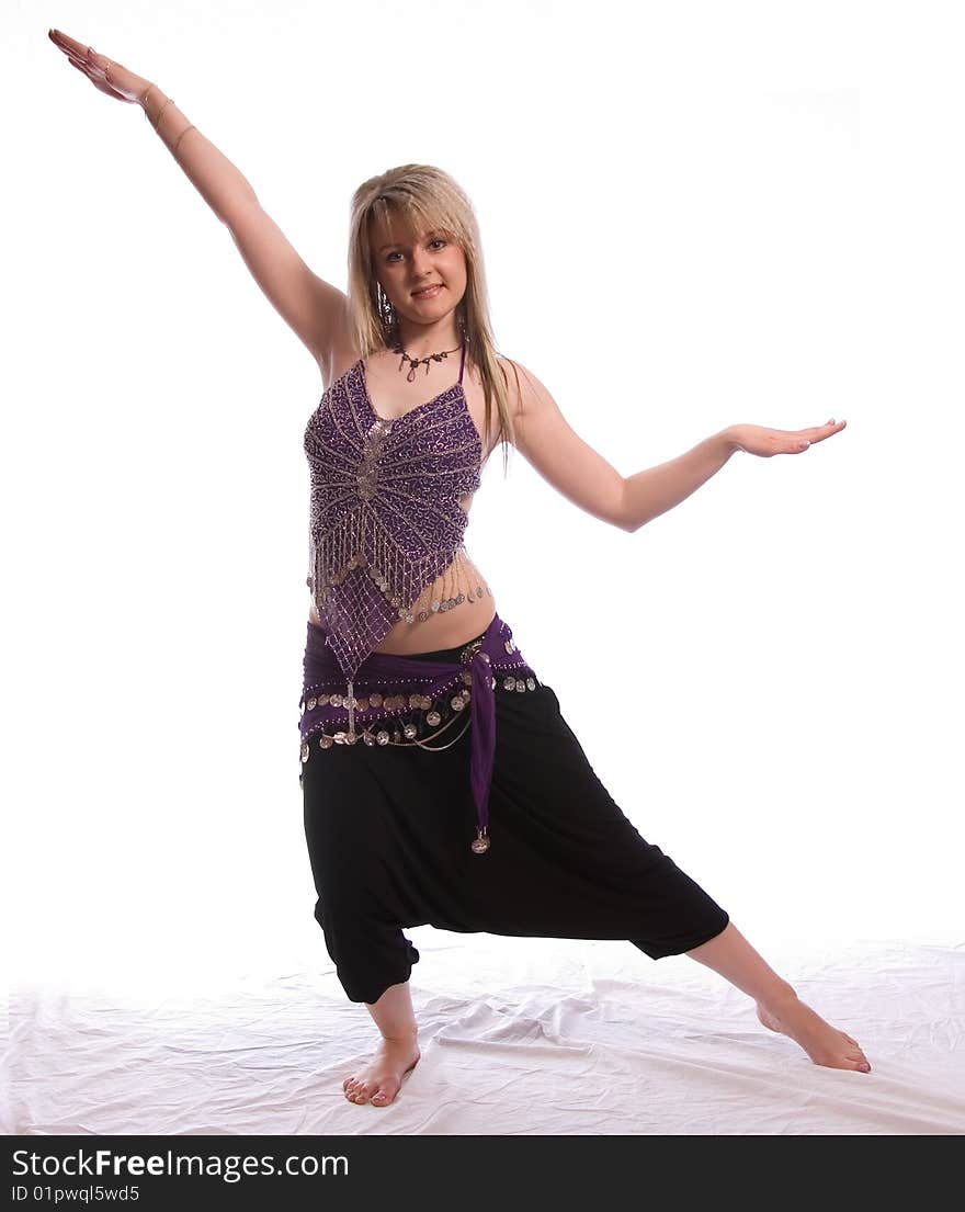 Indian dance. Young woman on white background.