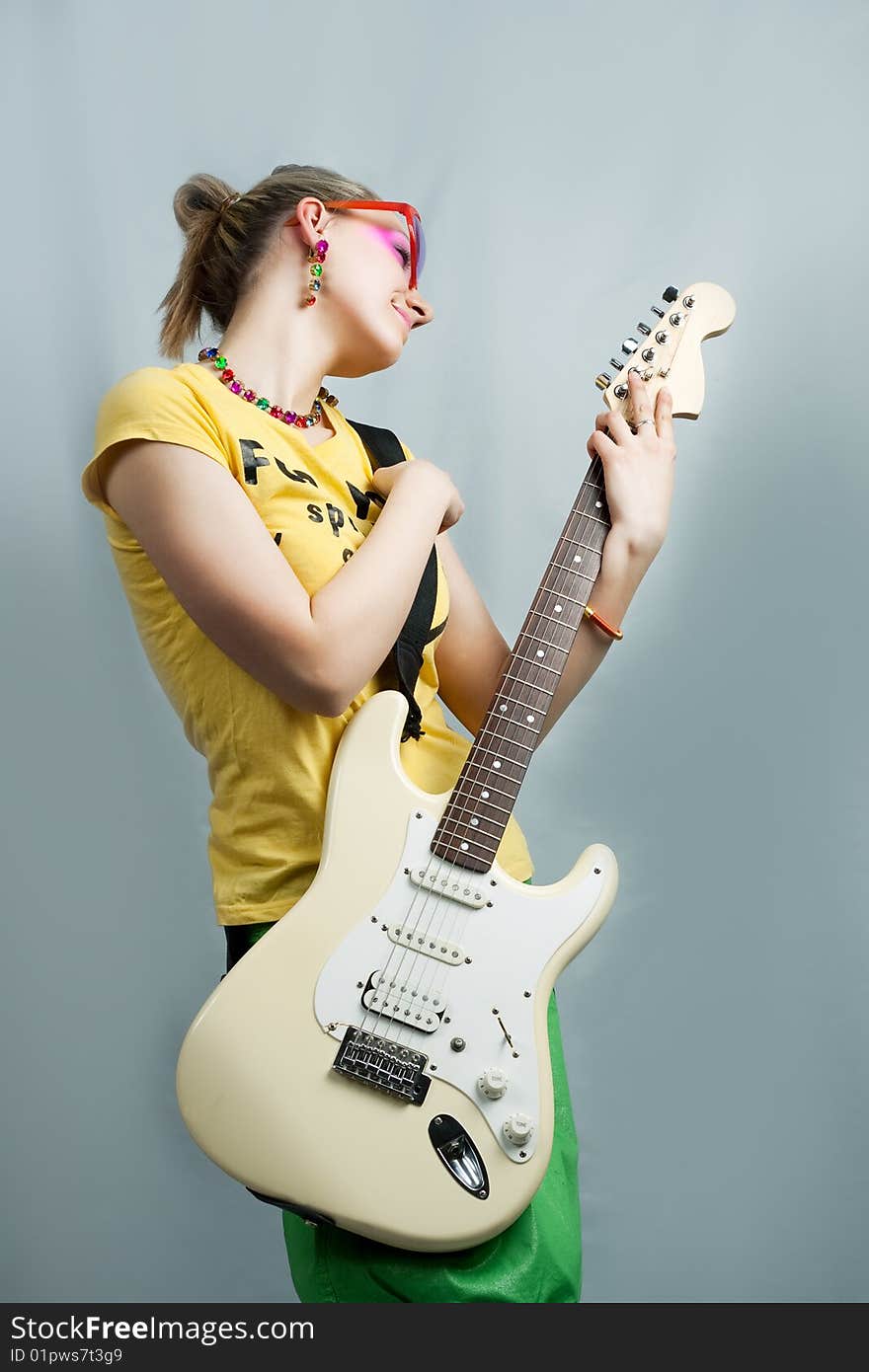 Young blonde with guitar