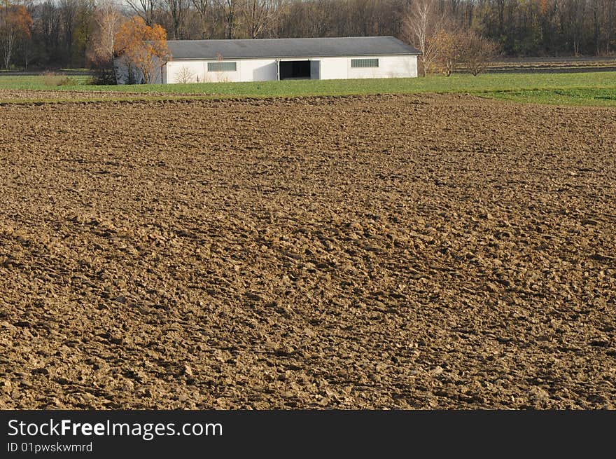 A wide view over farmland. A wide view over farmland.