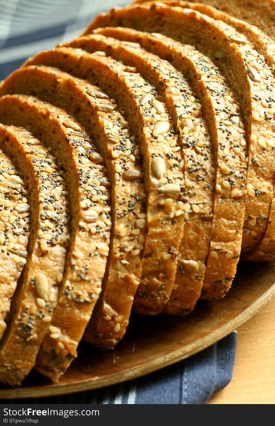 baked bread with sunflower seeds on plate