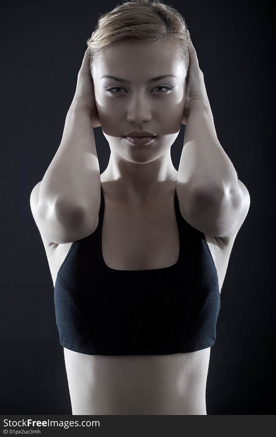 Dynamic image of a beautiful woman shot in studio. Dynamic image of a beautiful woman shot in studio