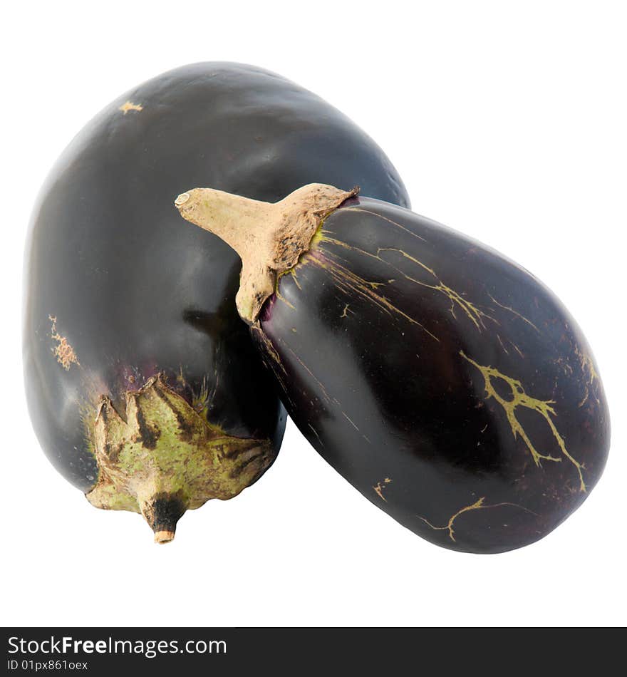 Still life of a large and small eggplant with natural patterns on their skin, isolated on white background, with clipping path. Still life of a large and small eggplant with natural patterns on their skin, isolated on white background, with clipping path.