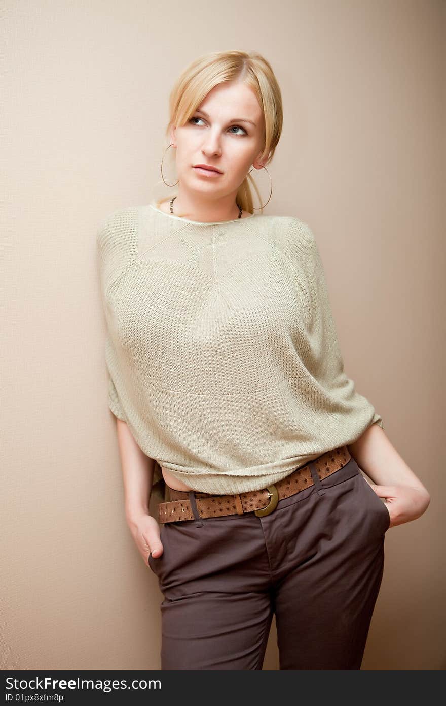 Portrait of the girl against a wall. Portrait of the girl against a wall