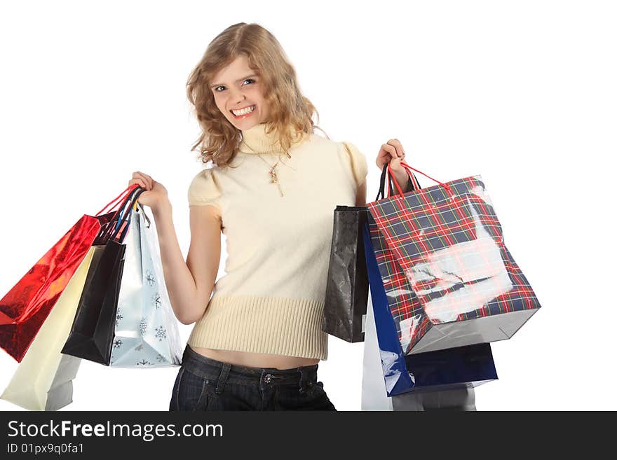 Smiling blonde with paper bags