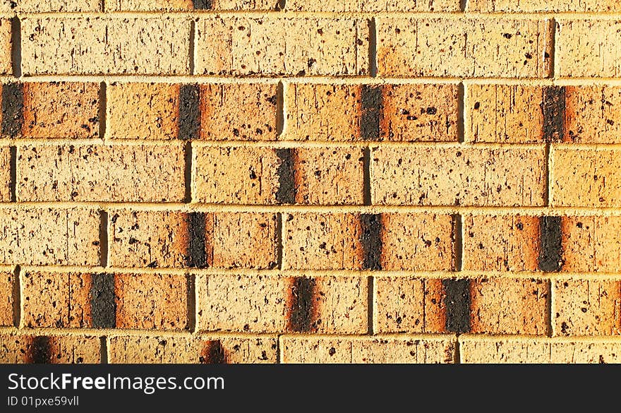 Brick wall showing colours and patterns of building bricks