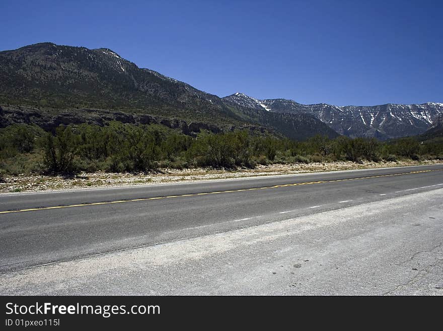 Freeway with nobody with the rocks on horizon. Freeway with nobody with the rocks on horizon