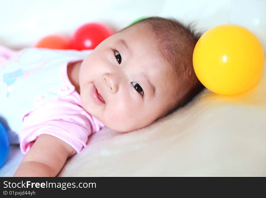 Closeup of adorable baby on a white background