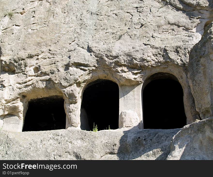 Three doors in Vardzia stones city in Georgia. Caucasus