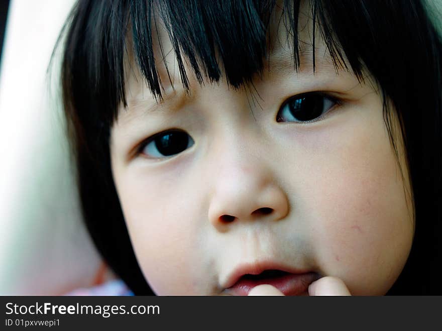 Bright picture of adorable chinese girl Angry. Bright picture of adorable chinese girl Angry