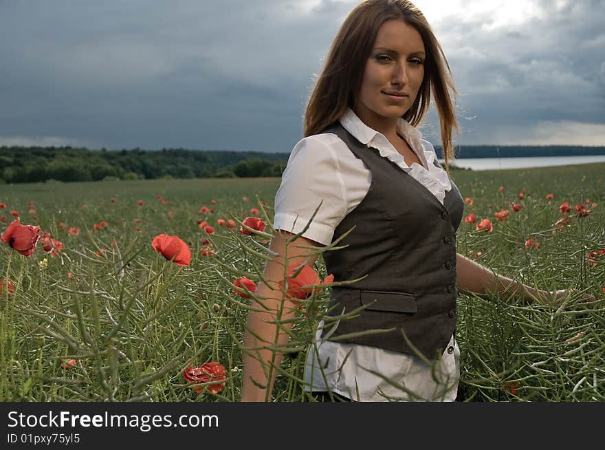 Young Businesswoman In A Field Of Flowers