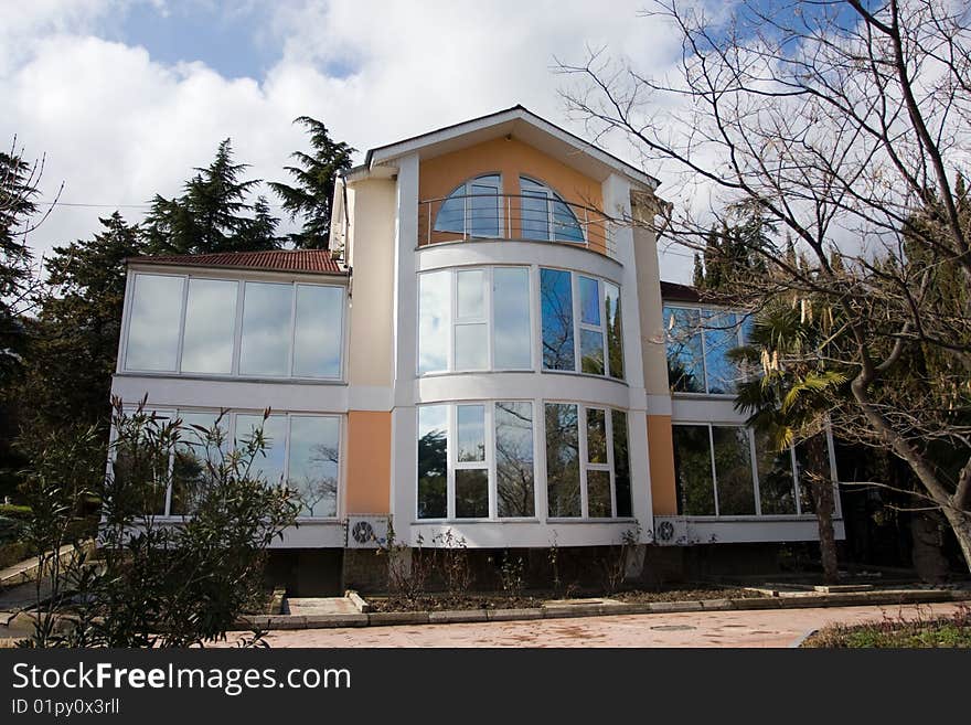 White modern building with big glass windows