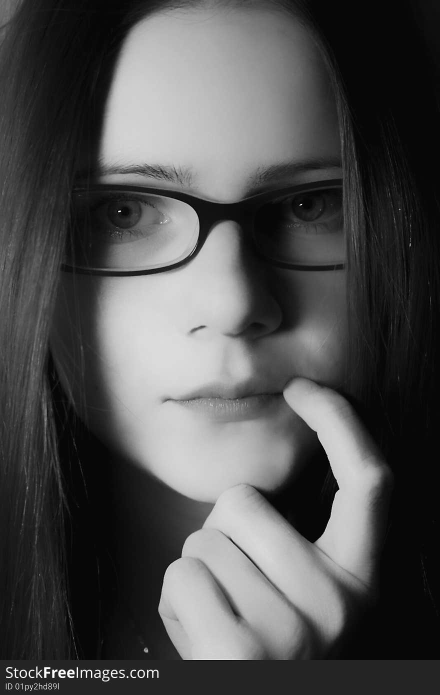 Young Woman In Glasses