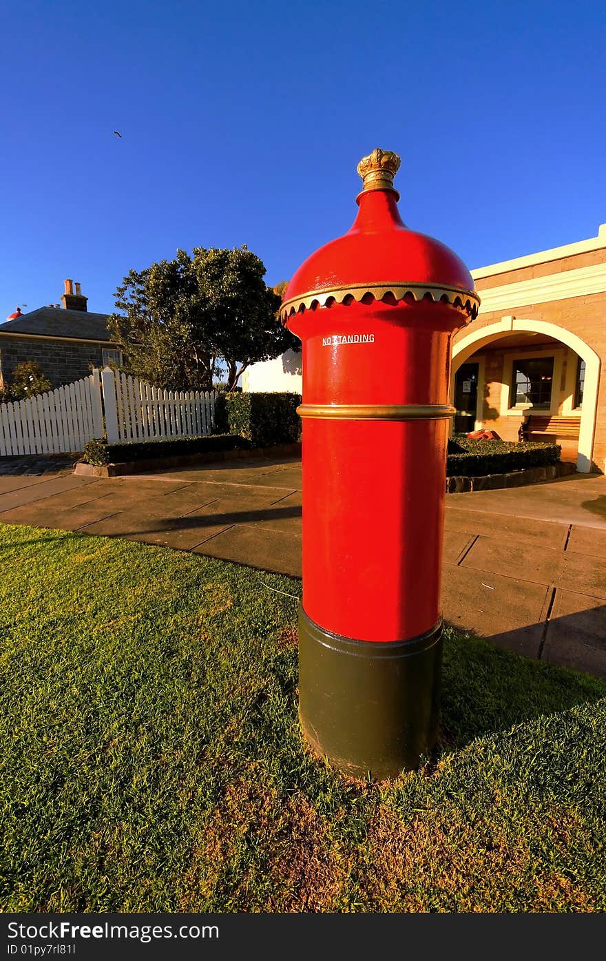 Bright red old post box in Australia