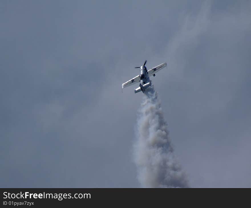 Plane performing midair tricks. Airshow Goraszka, Poland (June 2009)