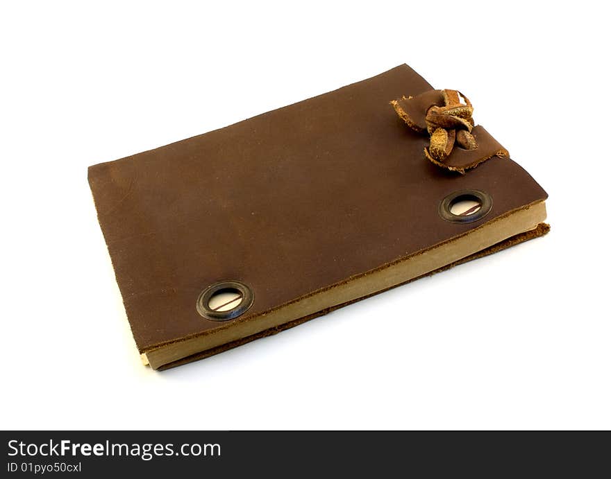 Old leather notepad isolated on white