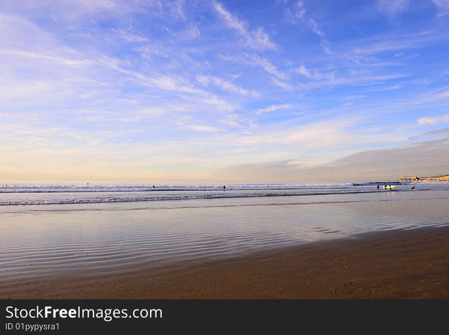 A beach under blue sky