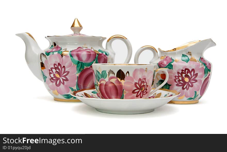 Tea service with floral pattern isolated