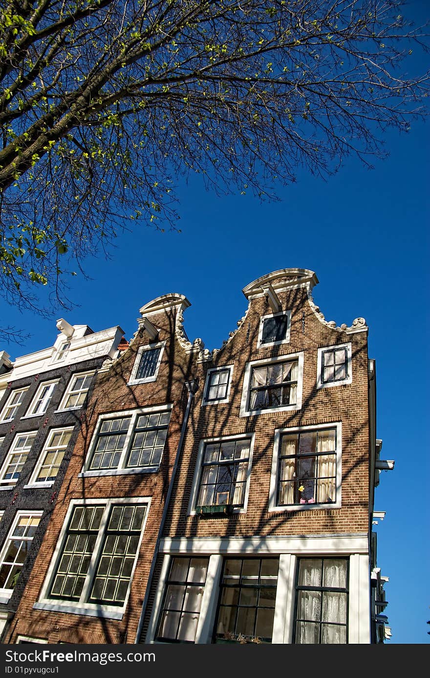 Front facades of some typical houses in Amsterdam. Front facades of some typical houses in Amsterdam.