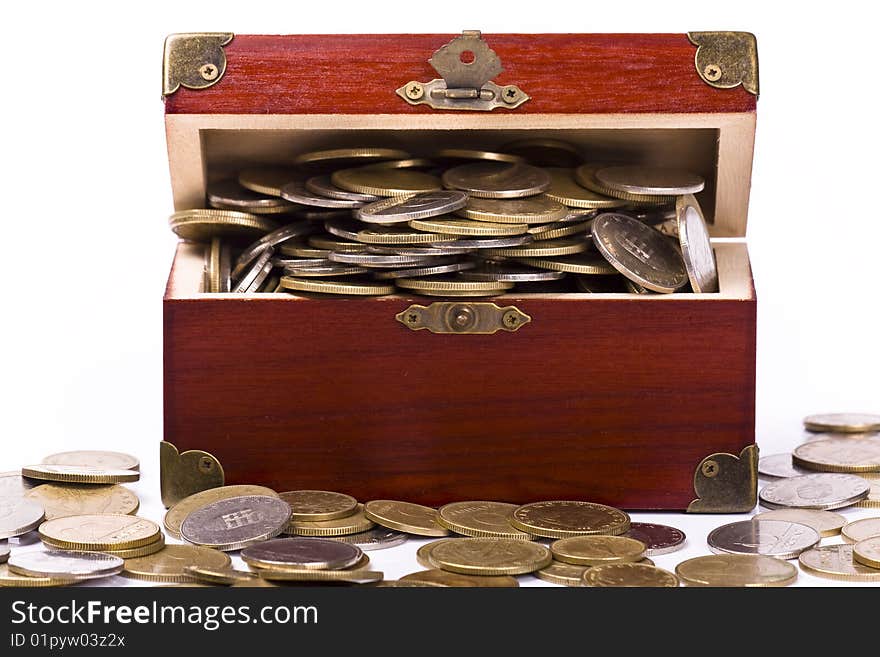 Wooden chest with coins inside isolated. Wooden chest with coins inside isolated