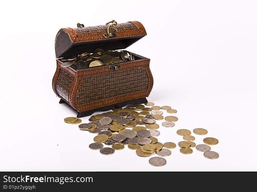 Wooden chest with coins inside isolated. Wooden chest with coins inside isolated