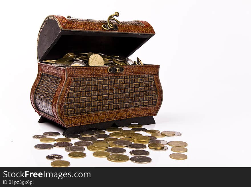 Wooden chest with coins inside isolated. Wooden chest with coins inside isolated