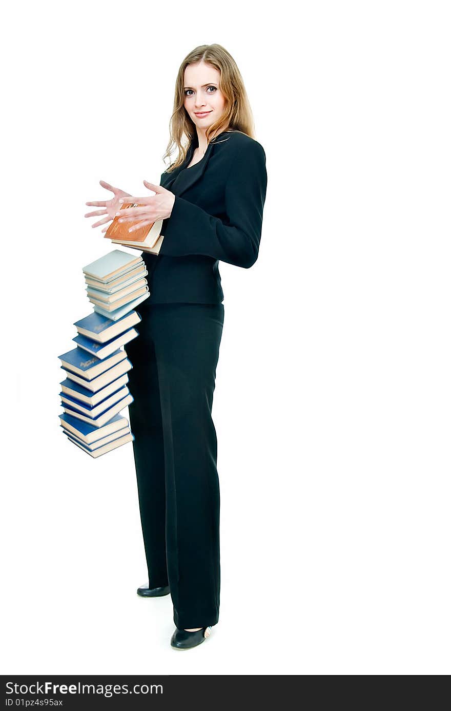 Young pretty girl with falling pile of books. Young pretty girl with falling pile of books