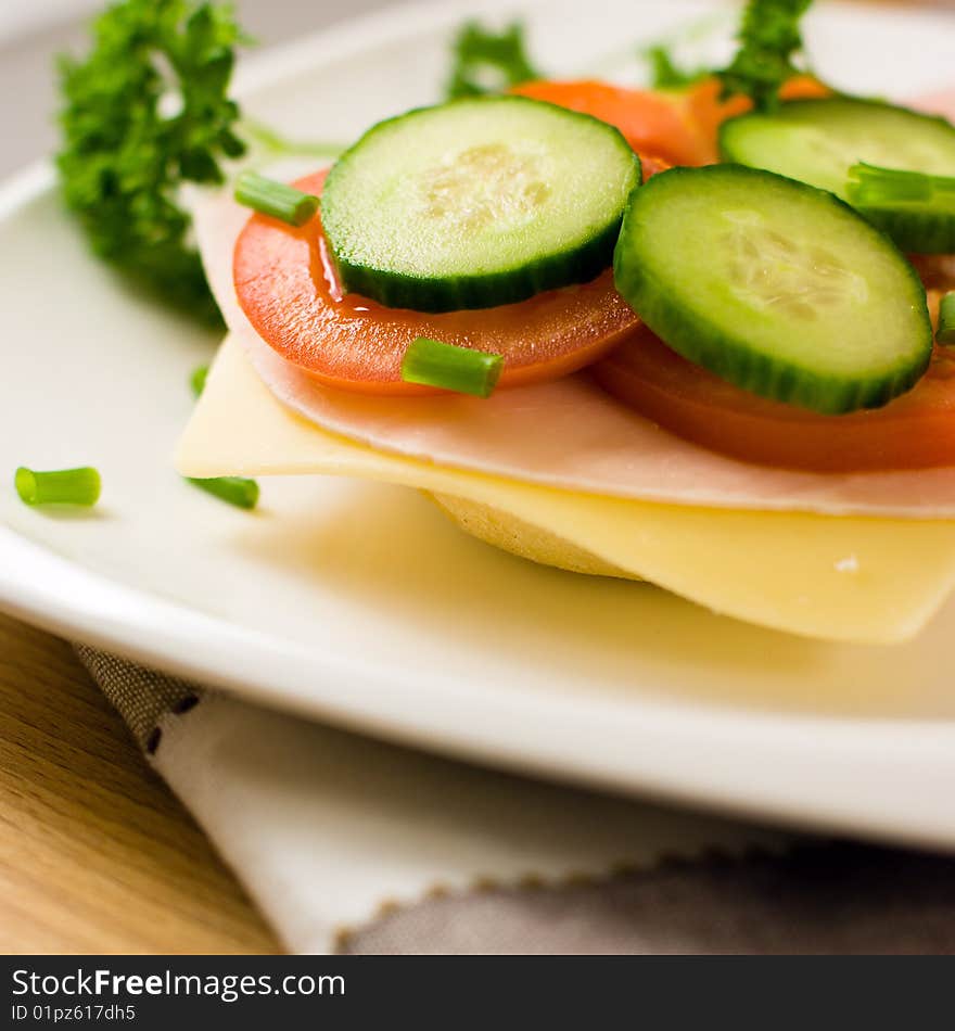 Canappe with ham,cheese and vegetables. Canappe with ham,cheese and vegetables