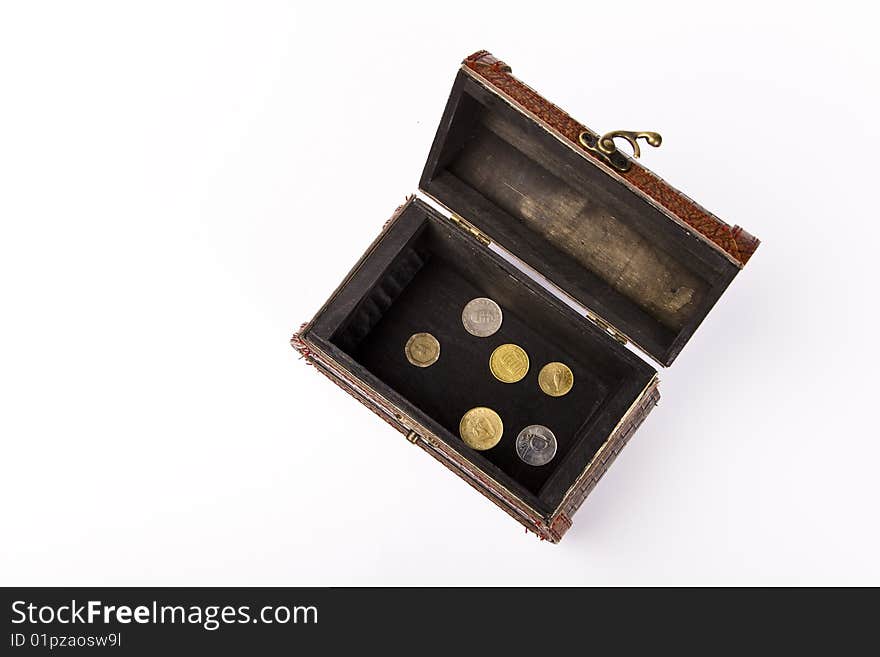 Wooden chest with coins inside isolated. Wooden chest with coins inside isolated