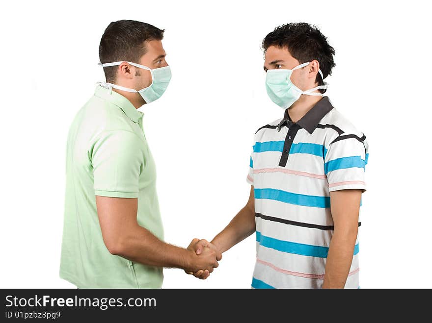 Portrait of two young people colleagues giving handshake and wearing protective mask concept of protection from flu,check also  <a href=http://www.dreamstime.com/medical-rcollection8351-resi828293>Medical</a>. Portrait of two young people colleagues giving handshake and wearing protective mask concept of protection from flu,check also  <a href=http://www.dreamstime.com/medical-rcollection8351-resi828293>Medical</a>