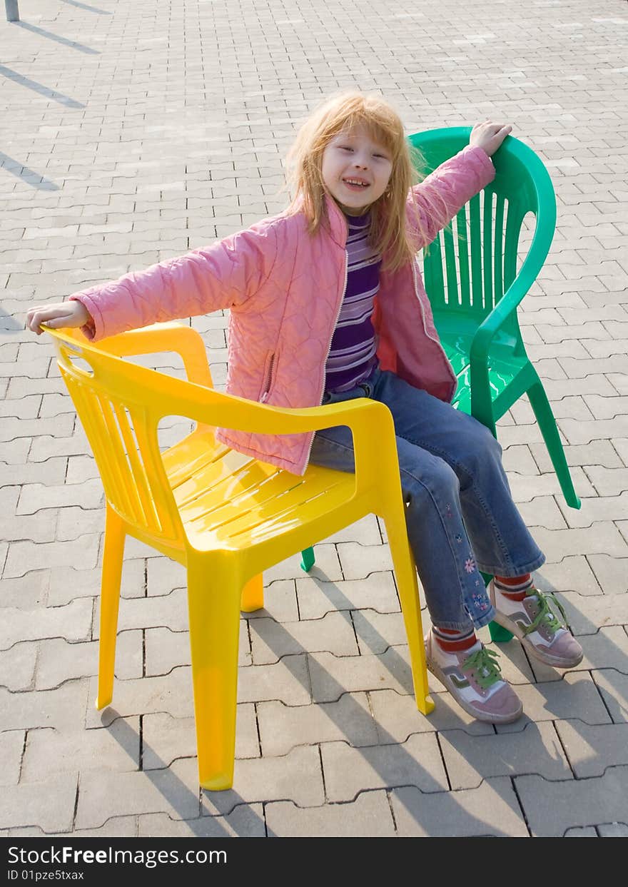 Two plastic chairs