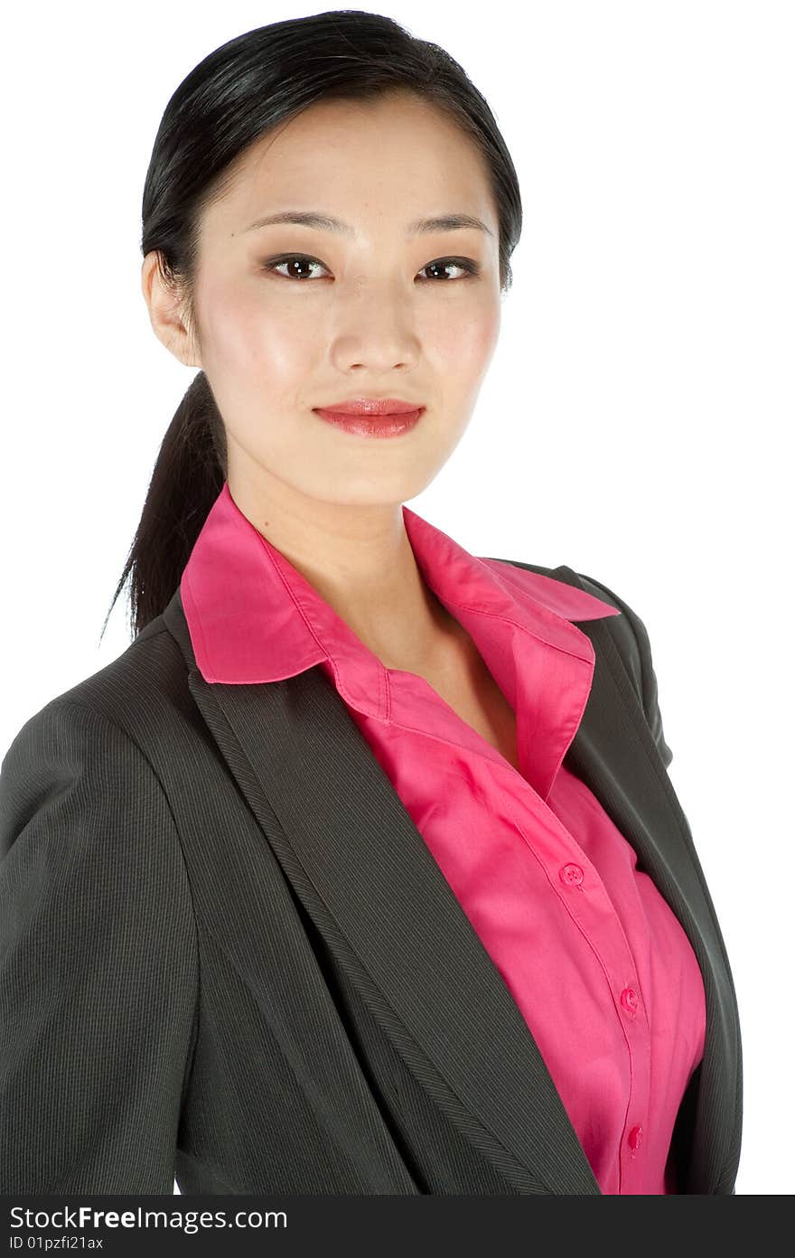 An attractive businesswoman posing in a studio