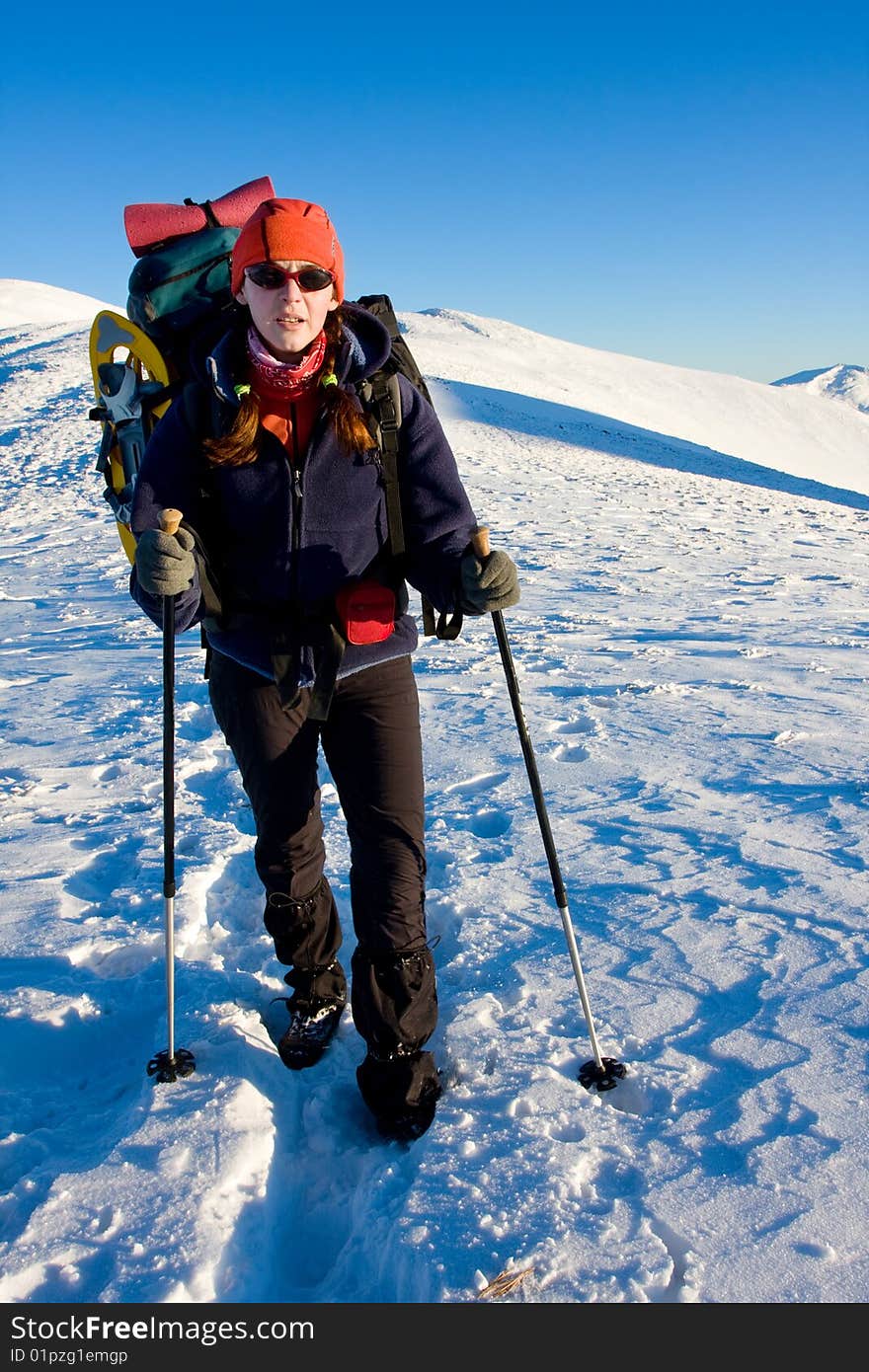 Hiker are in winter in mountains