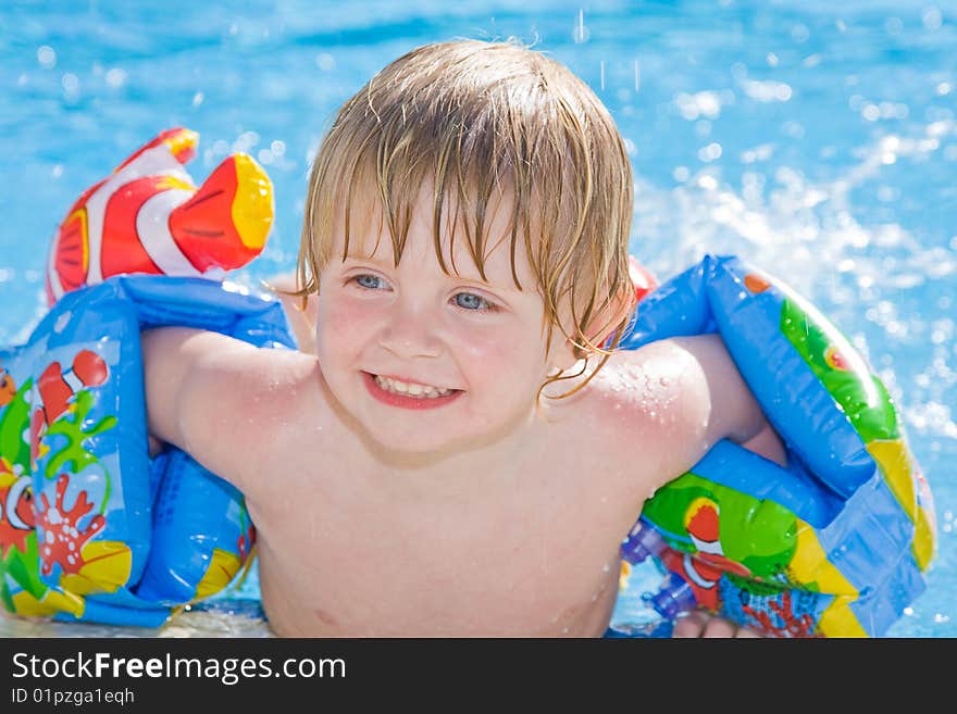 Little girl in the swimming pool. Little girl in the swimming pool