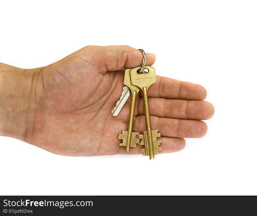 Hand with keys on a white background