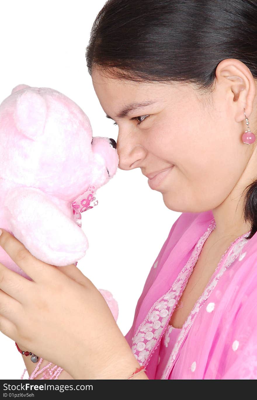 Girl play with teddy