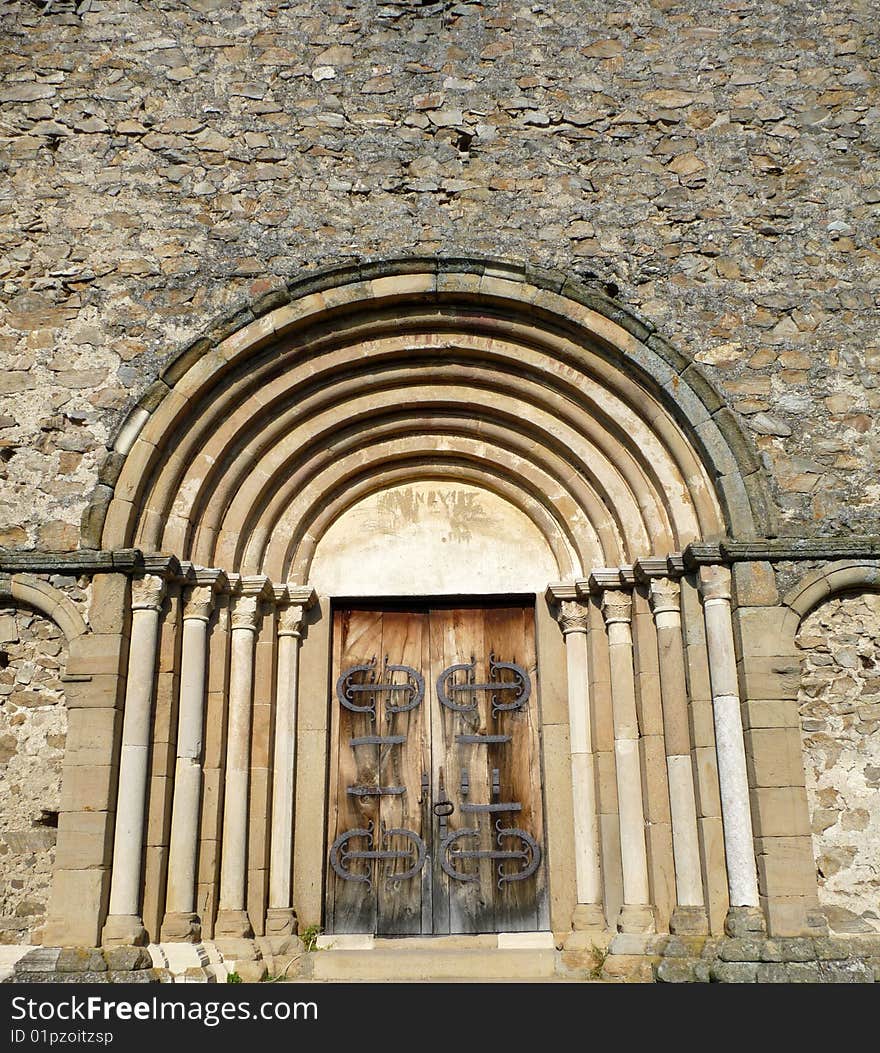 Front view of an ancient doorway to a medieval church. Front view of an ancient doorway to a medieval church