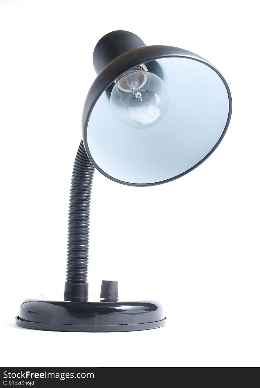 Color photo of the desk lamp. An isolated object on a white background. Color photo of the desk lamp. An isolated object on a white background